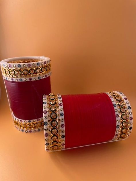 Available in sizes 2.4, 2.6, and 2.8. All of our chura sets come in a gold box and have never been worn or tried on. Free Shipping #churi #indian #bangladesh #usa #bangle #traditional Traditional Chooda Punjabi Bride, Red Choora Designs, Dark Red Choora, Chooda Designs Punjabi, Chura Designs Bridal, Chura Bridal Punjabi Bride, Chooda Designs Brides, Choora Designs, Red Chooda