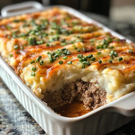 Loaded Mashed Potato and Meatloaf Casserole Delight Loaded Mash Potato Meatloaf Casserole, Meatloaf Potato Casserole, Meatloaf And Mashed Potatoes, Savory Meatloaf, Ooey Gooey Cake, Meatloaf Topping, Shepard S Pie, Meatloaf Casserole, Creamy Potatoes