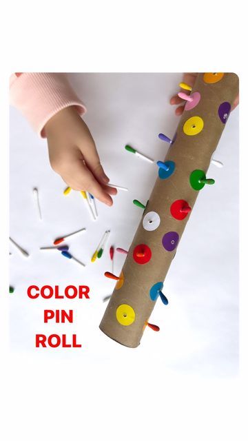 Rozanne | Bright Little Brains on Instagram: "Lana loved this easy DIY color pin activity! 🙌🏻 Such a great way to develop focus, concentration, fine motor skills and handeyecoordination! You’ll need: 🔴 A Kitchen towel roll 🟣 Dot stickers (Amazon- link in bio) 🟡 Drill or srewdriver 🟢 Q-tips ⬇️ ⭐️ We colored the tips with paint but you can also color it with food coloring. SAVE to try! #learningthroughplay #recycleandplay #playbasedlearning #playhack #kidsactivities #playideas #easypla Toddler Activities With Toilet Roll, Button Activity For Preschool, Montessori Fine Motor Activities, Sensory Classroom, Stickers Amazon, Steam Lessons, Focus Concentration, Dot Stickers, Diy Space