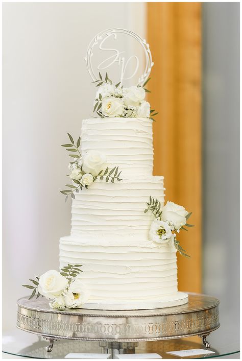 A gorgeous three tier wedding cake adorned with fresh  flower clusters, we love working with suppliers as local florists to Botleys mansion, Surrey Three Tiered Wedding Cake, Elegant Modern Wedding Cake, Botleys Mansion, Three Tier Wedding Cake, Three Tier Cake, 3 Tier Wedding Cakes, Elegant Modern Wedding, Gorgeous Wedding Cake, Modern Wedding Cake