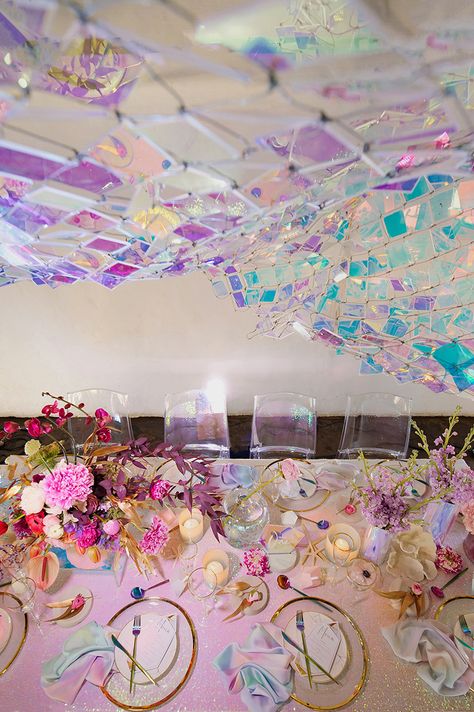 Holographic & Iridescent Wedding Ideas | One Fab Day | OneFabDay.com Iridescent Balloon Arch, Iridescent Photo Backdrop, Holographic Bachelorette Party, Irridescent Wedding Theme, Iridescent Wedding Decor, Irredescent Wedding, Iridescent Tablescape, Twinkly Wedding, Holographic Birthday Party