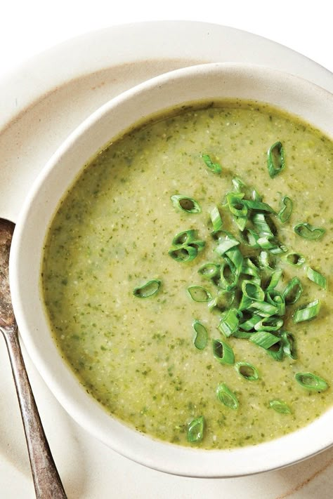 Blended potatoes and cannellini beans give a lusciously smooth texture to this creamy, dreamy green velvet soup. The vibrant hue comes from an assortment of leafy greens, frozen green veggies, and scallions. Fresh tarragon adds subtle licorice-like notes to the soup, while bright lemon juice and spicy hot pepper sauce add a delicious depth of flavor. Green Curry Chickpeas, Vegan Artichoke Recipes, Cranberry Squares, Green Bean Soup, Greens And Beans, Curried Sweet Potato Soup, Beans Soup, Carrot Tops, Forks Over Knives