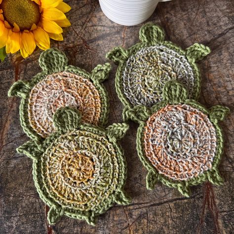 This listing is for a set of 2 or 4 crocheted turtle coasters made from cotton yarn. Add a little fun to your decor with these beach themed sea turtle coasters. They make a lovely hostess gift or great for a stocking stuffer. These turtle coasters measure approx.  4.5" by 5" Machine wash and lay flat to dry. My items are made in a non-smoking home. Colors on the monitor may vary slightly from the original color. Coffee cup not included. Thank you for browsing my shop!  If you have any questions Turtles Crochet, Turtle Coaster, Crocheted Turtle, Beach Coasters, Crochet Coaster Pattern, Coaster Sets, Color Coffee, Sea Turtles, Crochet Coasters