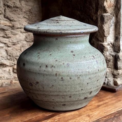 This is a beautiful keepsake mini sized urn.   I have made this extra small urn on my potters wheel using soft stoneware clay.   The approximate capacity is 5 cubic inches. (equal to about 5 lbs. before cremation) or 1/4 -1/3 cup.  Overall dimensions are 3.25" tall x 2.5" wide.  Please feel free to message me with any questions -Extra Helpful Information-  1.) This glaze surface is satin to satin matte. 2.) All of my pieces are one of a kind and handmade.   3.) I'm happy to send take extra images if you need.  Just send a message.:) 4.) If you need express or overnight shipping don't hesitate to message. 5.) If your overseas please message so I can provide accurate shipping costs. Small Urns, Keepsake Urns, Potters Wheel, Stoneware Clay, Handmade Pottery, Stoneware