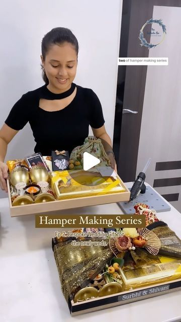 The Aesthetic Box| Customised Gift Hampers on Instagram: "Episode- 2 of Hamper Making Series: Making of a Bespoke Wedding Gift for the newly weds! 👩‍❤️‍👨

4 hrs of shooting and do along + 3 hrs of editing!! 😅Shooting process reels is always very challenging, but it was fun to shoot it for y'all so that you get to learn and upgrade your skills in trying creative things. Please show some love as your support is what keeps us going! 💛

We hope you liked this detailed tutorial video  and if you have any doubts/ queries, please leave them in the comments section or DM us! Let's learn and grow together!! 🌟
Regards, T.A.B! 

[Wedding gifts, Bespoke Gifts, Tutorial videos, Gifts Packaging, Making of a wedding gift platter , DIY Tutorials for Gifts, Unique Gifts, Creative Learning, Customised Wedding Gifts Hamper, Wedding Gift Box Ideas, Wedding Gift Hampers, Hamper Ideas, Christmas Gift Hampers, Gifts Creative, Personalized Engagement Gifts, Luxury Christmas Gifts, Creative Things