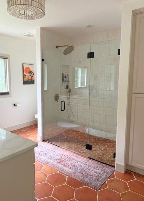 Terracotta Tile Shower Floor, Spanish Tile In Bathroom, Tan Tile Shower Bathroom, Bathroom Saltillo Tile Floor, Traditional Home Decor Bathroom, New Mexico Fireplace, Bathrooms With Terracotta Floors, Terra Cotta Shower Tile, Stained Concrete Floors Bathroom