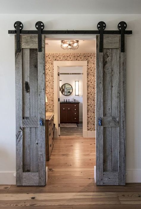 Rustic Bedroom Sliding Barn Door #barndoor #farmhousedecor #modernfarmhouse #modernfarmhousedecor #rustichomedecor #rustichomedecorideas #rusticdecor #rusticdecorideas #rusticfarmhouse #rusticfarmhousedecor #decor #decoratingideas #homedecor #homedecorideas Bedroom Barn Door, Koti Diy, Barn Door Designs, Mirror On The Wall, Modern Farmhouse Decor, Rustic Bedroom, Barn Doors Sliding, Sliding Barn Door, Rustic Cabin