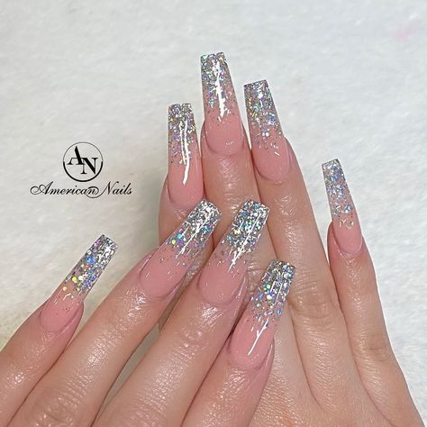 Tired of the same old look? Why not mix work and play with glitter ombre nails? Here are some sparkly chic ombre nail designs for you to DIY or at the salon! Click the article link for more photos and inspiration like this // Photo Credit: Instagram @americannails_winnipeg Dip Powder Nails Sparkle Ombre, Long Glitter Ombre Nails, Pink And Silver Glitter Ombre Nails, Sparkle Ombre Acrylic Nails, Glitter Nails Ombre Sparkle, Glitter Gradient Nails Acrylic, Sparkle Ombre Nails Square, Glitter Tip Nails Ombre, Ombre Nails With Bling