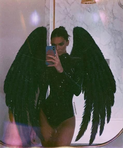 Kendall Jenner Halloween costume dark angel. Oversized black wings and bodysuit. Instagram inspiration baddie aesthetic. Bad girl Vibes Halloween inspiration #halloween Black Angel Wings, Black Angel, Kendall Jenner, Angel Wings, Angel, Mirror, Halloween, On Instagram, Instagram