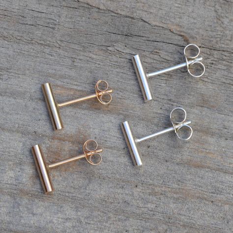 A simple yet elegant pair of handmade bar earring studs.Add a dash of sophistication to your look. These simple, yet elegant bar earring studs are handmade from solid sterling silver using the traditional method which has been used to make jewellery for thousands of years. It comes with an anti-tarnish silver polishing cleaning cloth. This will be gift wrapped and make a nice gift for yourself or a loved one.These bar earring studs are handmade in solid sterling silver at our studio in ... Small Diamond Stud Earrings, Elegant Bar, Bar Earring, Handmade Bar, Simple Silver Jewelry, Diamond Shape Earrings, Stick Earrings, Cleaning Silver Jewelry, Casual Earrings