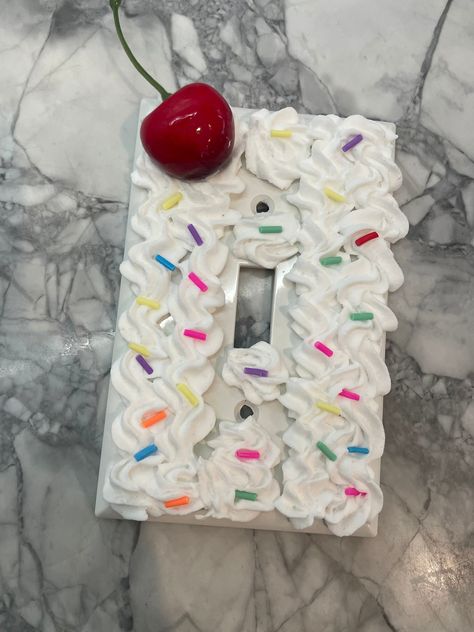 Super cute light switch cover. Made with faux sprinkles, frosting and a shiny cherry on top! Adorable for a little girls room! Fake Cake Ideas Diy, Candy Themed Room, Birthday Cake Y2k, Candy Themed Bedroom, Candy Room, Room Makeup, Faux Cake, Bakery Crafts, Cake Light