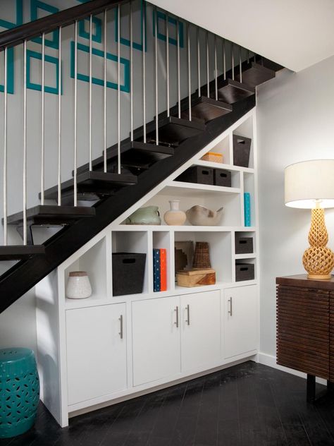 The decorating experts at HGTV.com share 25 decorating mistakes to avoid when designing your interior and their solutions. Under Stairs Storage Solutions, Space Under Stairs, Closet Under Stairs, تحت الدرج, Stairs Renovation, Open Trap, Open Stairs, Staircase Storage, California Closets