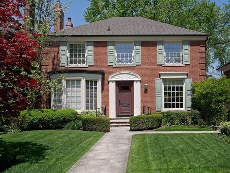 Color selection is an important factor when decorating red brick houses. Unfortunately, the rich, warm hues of red brick don’t go with every color shu... | 2 Quietude Red Brick House Shutter Ideas, Brick House Shutters, Red Brick House Exterior Curb Appeal, Brick Colonial House Exterior, Shutters Brick House, House Shutter Colors, Brown Brick Exterior, Exterior Shutter Colors, Orange Brick Houses