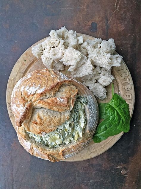 In this hot spinach and artichoke dip, the vegetables are cooked with garlic and cheese then poured into a hollowed out sourdough bread bowl for serving so guests can tear at the bowl and scoop out the gooey dip. Sourdough Bread Bowl Recipe, Spiced Desserts, Raspberry Compote Recipe, Hot Spinach And Artichoke Dip, Bread Bowl Dip, Indian Food Menu, Veggie Desserts, Bread Bowl Recipe, Spinach And Artichoke Dip