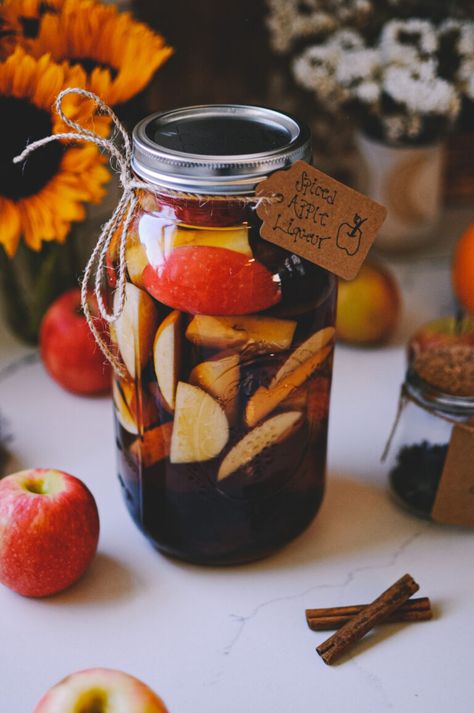 How to Make Apple Spiced Liqueur | Herbal Academy | This homemade apple spiced liqueur recipe gives your taste buds a welcome dose of sweet and spice, with a little bit of heat. Herbal Alchemy, Brown Sugar Simple Syrup, Festive Holiday Drinks, Cordial Recipe, Herbal Academy, Homemade Liquor, Spiced Drinks, Medicinal Garden, Thanksgiving Drinks