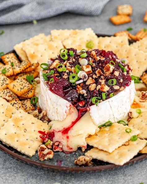 Savor the perfect blend of creamy and tart with this Baked Brie with Cranberry Sauce recipe! Ideal for holiday gatherings and easy to make. #BakedBrieDelight #CranberryCheeseLove Simple Holiday Appetizers, Recipes To Impress Guests, Baked Brie With Cranberry Sauce, Brie With Cranberry Sauce, Baked Brie With Cranberries, Brie With Cranberries, Baked Brie With Cranberry, Bake Brie, Caprese Salad Bites