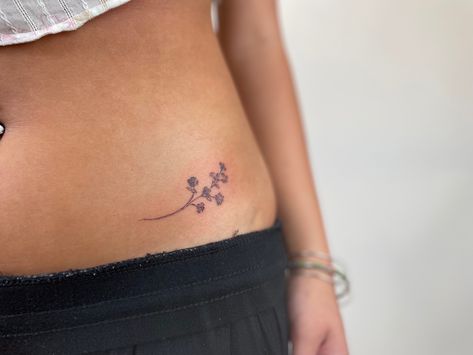 Low Waist Tattoos For Women, Stomach Flower Tattoo, Small Waist Tattoos, Waistline Tattoos Women, Lower Waist Tattoo, Low Stomach Tattoo, Hip Flower Tattoo, Lower Stomach Tattoo, Pelvic Tattoo Hip