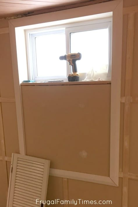 Here's how to make a small basement window look bigger and beautiful. It cost <$50! Part of our budget basement makeover. So many affordable DIY ideas! Green walls ~ white trim ~ shutters ~ wood ceiling Basement Window Treatments, Basement Window, Basement Decoration, Door Makeover Diy, Fake Window, Basement Laundry, Diy Basement, Faux Window, Basement Windows