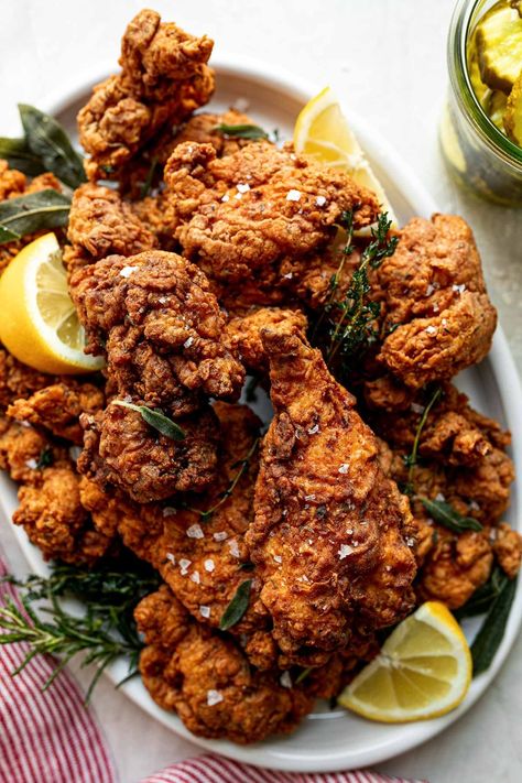 My all-time favorite homemade Buttermilk Fried Chicken! Buttermilk-soaked chicken dusted with flour & fried in herb-infused oil until crispy. Brine Chicken Breast, Brined Chicken, Homemade Fried Chicken, Brine Chicken, Making Fried Chicken, Buttermilk Chicken, Buttermilk Fried Chicken, Infused Oil, Crispy Fried Chicken