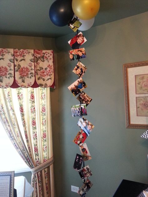 Graduation Decoration. Use Super Glue to attach a six foot long piece of ribbon… Picture Hanging Ideas For Party, Pictures On Balloon Strings, Balloon Pictures Hanging, Balloon With Pictures Hanging, Photos Hanging From Balloons, Pictures Hanging From Balloons, Balloons With Pictures Attached, Birthday Picture Wall, Diploma Wall