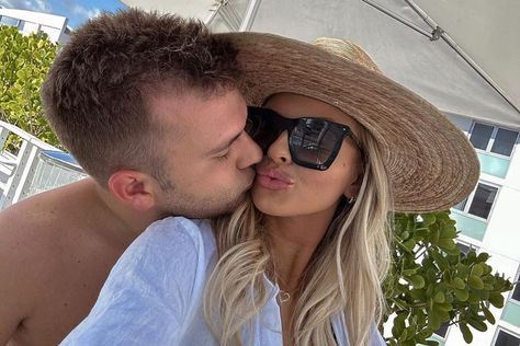 Chase Chrisley and Fiancée Emmy Medders Share a Kiss in Miami as Parents Serve Time in Prison Emmy Medders, Chase Chrisley, Chrisley Knows Best, Tax Fraud, Living In Nashville, Status Update, Baseball Park, Engagement Season, Relationship Timeline