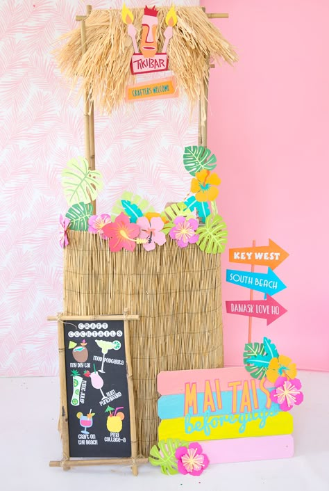 Create this easy DIY tiki bar for your next party using a plain, affordable bookshelf and create custom decorations with the Cricut Explore Air 2 Tiki Photo Booth Ideas, Diy Surfboard Decor, Cricut Tiki Projects, Tiki Beach Party, Aloha Party Photo Booth, Diy Tiki Bar Sign, Tiki Bars Diy, Luau Party Food, Deco Jungle