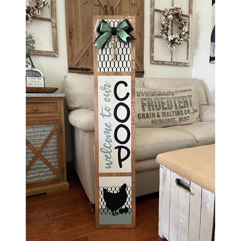 Welcome guests to your home with the charming Welcome to our Coop large wood painted porch leaner. This unique piece measures 9.5" x 48" and has been sealed making it perfect for both indoor and outdoor use in covered areas. The intentionally distressed and hand-painted design, complete with bows and wood beads accents, adds a touch of rustic charm to any space. Each leaner is one of a kind, making it a special and personalized way to greet visitors. Tag Door Signs, Welcome To The Coop Sign, Chicken Porch Sign, Cow Porch Leaner, Fall Leaner Boards, Welcome To Our Coop Sign, Fall Signs Wooden Porch, Spring Porch Signs, Porch Sign Ideas