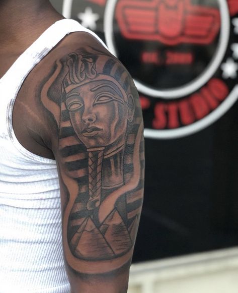 Egyptian Shoulder Tattoo Men, Ancient Egyptian Tattoo Sleeve, Black Men Half Sleeve Tattoo Ideas, Egyptian Tattoo Men Arm, Black King Tattoo, Savage Tattoo For Men, African Warrior Tattoo For Men, Egyptian Tattoo Men, Black Men Arm Tattoos