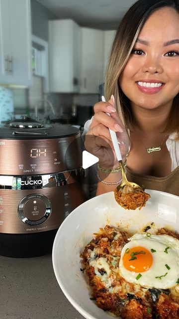 107K views · 4.7K likes | Stephanie | Easy recipes 🔪 on Instagram: "POV: Making a quick meal in your rice cooker 🍚  Rice is life and there’s nothing better than some quick comfort food. I  made a Cheesy Kimchi Fried Rice in my favorite rice cooker by @cuckoo_america.  Not only does this rice cooker cook the most amazing rice using induction heating and high pressure but it’s a been a trusted Korean brand for over 40 years. Don’t tell me you don’t see Cuckoo rice cookers in all your favorite Kdramas 😎  I  love using my Cuckoo rice cooker because the rice always comes out, perfectly fluffy, chewy and I swear it makes the rice taste sweeter! It’s like it really enhances the natural sweetness of the rice.   Use promo code “STEPHANIE20” for 20% off for CRP-JHR1009 when you buy from cuckooame Rice Cooker Cheesecake, Cuckoo Rice Cooker, Nose Kiss, Quick Comfort Food, Rice Cooker Recipes, Kimchi Fried Rice, Rice Cookers, Induction Heating, Korean Brand