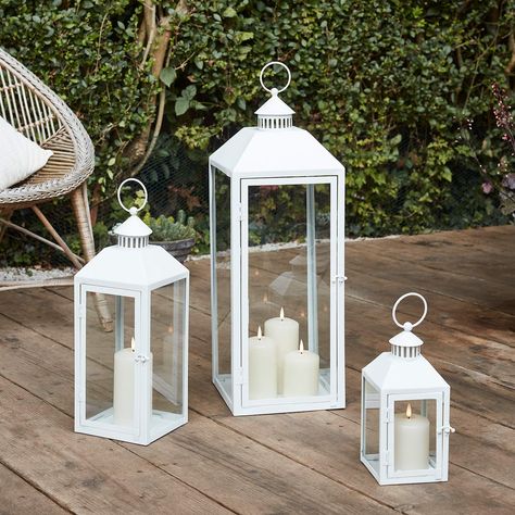 Lights4fun Set of 3 Outdoor Large Floor Lanterns White Metal TruGlow™ LED Candles Timer: Amazon.co.uk: Lighting Flameless Candles Wedding Centerpieces, Large Floor Lanterns, Summer Interior Design, Floor Lanterns, Realistic Candles, Timer Candles, Garden Lantern, Candle Wedding Centerpieces, White Lanterns