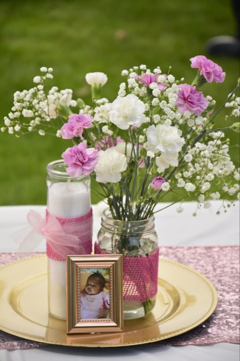 Easy DIY table centerpieces for a baptism party! 1st Birthday Flower Centerpiece, Christening Centerpieces Girl, First Birthday Centerpieces Girl, Bautizo Centerpieces For Girl, Diy Baptism Decorations, Simple Baptism Decorations, Baptism Centerpieces Ideas, Baptism Centerpieces Girl, Centerpieces For Baptism