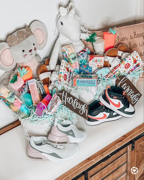 Easter baskets are ready!!! Can’t wait to see their faces! 🤗 http://liketk.it/3bgky / #liketkit @liketoknow.it #LTKfamily #LTKSpringSale #LTKkids @liketoknow.it.family #easter #basket #kids #kid #girl #girls #stuffers #sandals #white #gift #ideas #play #games #puzzle #clay #candy #cute #spring #daughter #mom #tags #name #adorable #deal #idea #bunny #stuffed #unicorn #nike #shoes #sneakers #kicks 1st Easter Basket Girl, Family Easter Basket, Bath Basket, Games Puzzle, Stuffed Unicorn, Clay Candy, Girls Easter Basket, Girls Playroom, Kids Easter Basket