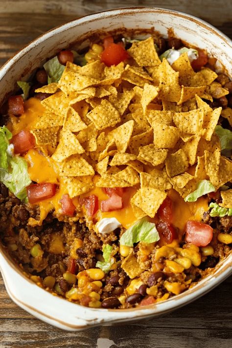 Walking Taco Casserole: A Family Favorite with a Twist - Growing up, walking tacos were always a treat for my family. Whether it was a Friday night football game or a casual backyard get-together, the Walking Taco Casserole With Cream Cheese, Slow Cooker Walking Tacos, Family Taco Night Ideas, Walking Tacos For A Crowd, Tacos With Rice, Tacos For A Crowd, Spaghetti Squash Fritters, Walking Taco Casserole, Squash Fritters