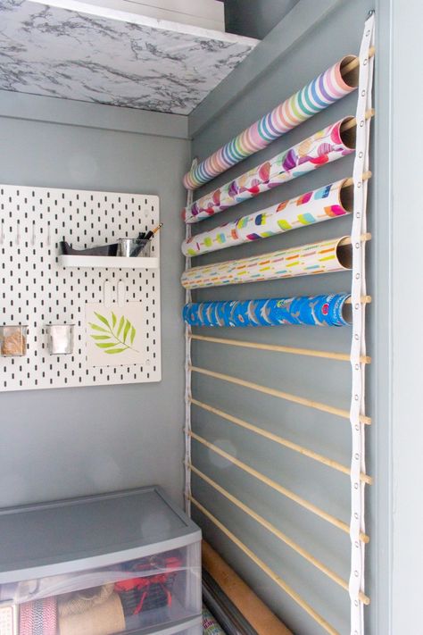 Peg Board Gift Wrapping Station, Gift Wrapping Cupboard, Wrapping Tissue Paper Storage, Gift Wrapping Station Diy, Wrapping Closet Organization, Wrapping Paper Closet, Gift Wrapping Closet, Craft Room Closet Organization, Wrapping Station Ideas