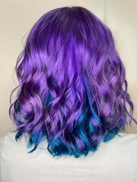 Blue purple short split-dye jewel hair color Split Dye Purple And Blue, Blue And Purple Hair Dye Ideas, Purple Multicolor Hair, Half Purple Half Blue Hair, Two Tone Purple Hair, Dark Blue And Purple Hair, Blue And Violet Hair, Jewel Tone Hair, Hair Split Dye