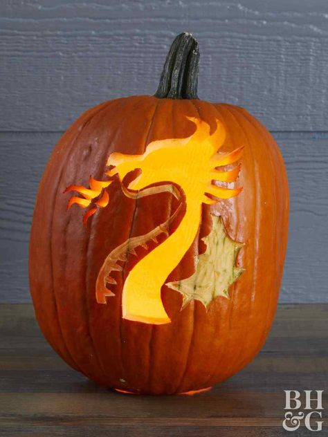 This dragon pumpkin design breathes fire, which looks so realistic once a candle is placed inside. This design plays with a mix of scraping and full carving for different amounts of light in different shapes. Little knights and princesses will love this easy pumpkin carving. Zero Pumpkin Carving, Dragon Pumpkin Stencil, Dragon Pumpkin Carving, Zero Pumpkin, Dragon Pumpkin, Pumpkin Face Carving, Easy Pumpkin Carving Ideas, Printable Pumpkin Stencils, Pumpkin Carving Stencils Free