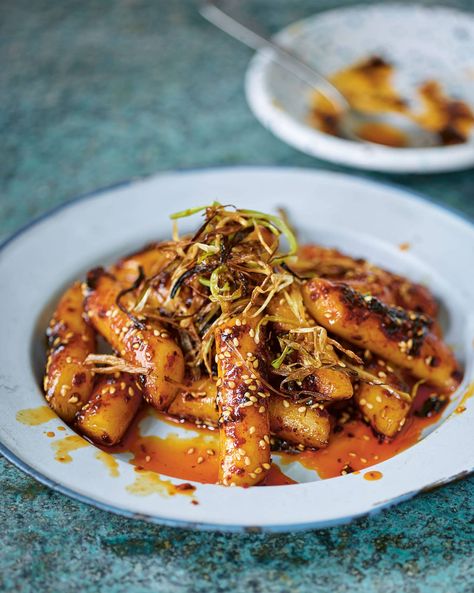 Tteokbokki with Chili Crisp and Honey Recipe | Saveur Korean Rice Cake, Chili Crisp, Korean Street Food, Walnut Salad, Asian Grocery, Peanut Brittle, Spicy Chili, Honey Recipes, New Cookbooks