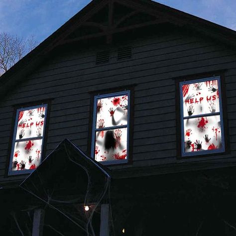 17 Best Halloween Window Display Ideas You Will Want to Try Creepy Window, Zombie Posters, Haunted House Party Decorations, Zombie Silhouette, Halloween Window Display, Scary Haunted House, House Party Decorations, Halloween Window Decorations, Haunted House Party