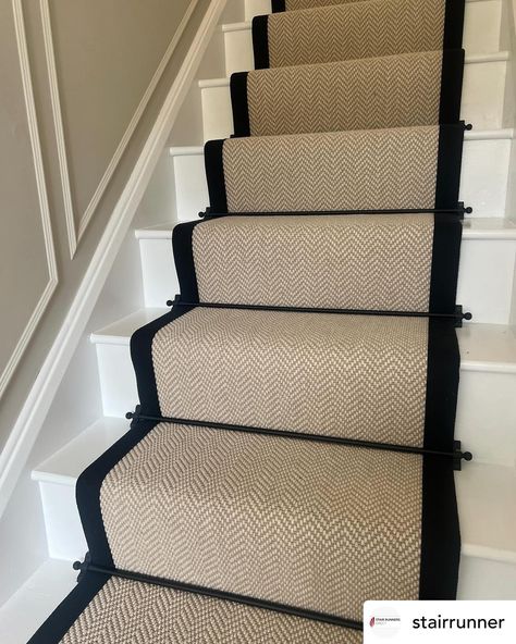 Definitely one of our best sellers! Fibre Flooring Chalk herringbone with black border @fibreflooring @jaspa_binding_tapes stair runner and landing carpet. Black jubilee stair rods @stairrods_uk #stairs #stairrunner #carpet #stairrods #stairrunners Stairs With Carpet Runner And Bars, Beige And Black Stair Runner, Stair Runner Carpet On Dark Wood, Carpet Runner On Stairs Brass Rods, Stair Carpet Runner With Rods, Stair Runner With Border, Wooden Stair Runner, Black Stair Rods, Stair Runner Black Trim