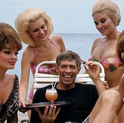 Kings and Queens of Cool on Instagram: "Ah, the arduous gig of being James Coburn! There he is, kicking back in Jamaica, July 1966, with sunshine, cocktails, and a bikini brigade—all in a day's work on the set of "In Like Flint." Directed by Gordon Douglas, this sequel to the laugh-riot "Our Man Flint" really made us question our career choices! 😅 #MondayMotivation 📸 Paul Slade More on @kingsqueensofcool Follow us for your daily dose of vintage aesthetics. A collection of more than 10,000 cool James Coburn Our Man Flint, Our Man Flint, James Coburn, Kings And Queens, Vintage Aesthetics, Career Choices, Kick Backs, I Spy, Day Work