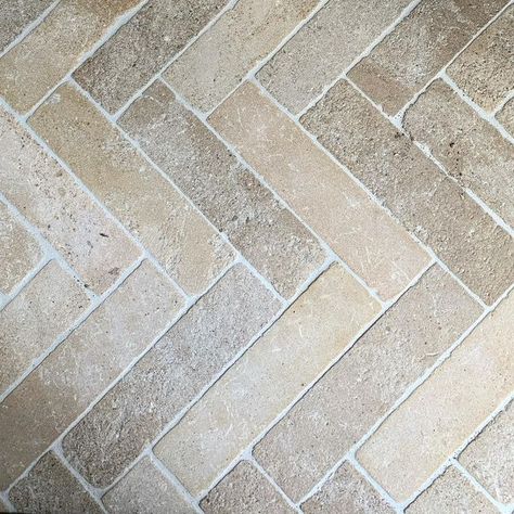 〰️ project X coastal 〰️ Location hire on Instagram: "A close up of our favourite tiles in the house 😍. They are an absolute delight to walk barefoot on… lots of juicy texture. Featured in our Powder Room and Laundry. These stunning limestone tiles are from @ecooutdoor and are called “Pendell Batons”. #floortiles #laundry #limestonetiles #ecooutdoor #herringbonefloor #moderncoastal #coastalluxe #stonefloor #stonetile" Herringbone Limestone Floor, Herringbone Tile Kitchen Floor, Astro Turf Garden, Limestone Bathroom Floor, French Flooring, Limestone Tiles, Mudroom Flooring, Contemporary Beach House, Paving Ideas