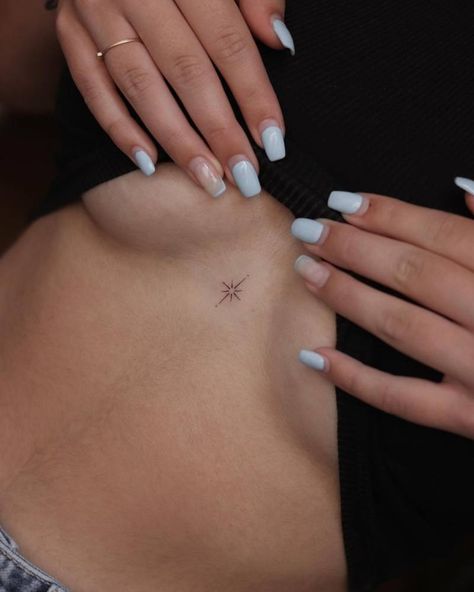 Minimalistic style north star tattoo done on the North Star Back Tattoo, North Star Tattoo Behind Ear, Spine Star Tattoo, Sternum Small Tattoo, The North Star Tattoo, Minimalistic Star Tattoo, Star Sternum Tattoo Women, Inbetween Breast Tattoo Ideas, Tiny Sternum Tattoo Women