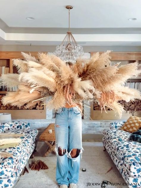 Dyed Pampas Grass Diy, Pampas Grass Cloud Diy, Pampas Grass Light Fixture, Diy Pampas Grass Hanging Arrangement, Pampas Grass Halloween Decor, Diy Wedding Arch Pampas, How To Make A Pampas Grass Wall Hanging, Pampas Grass Mantle Decor, Pampas Chandelier Diy