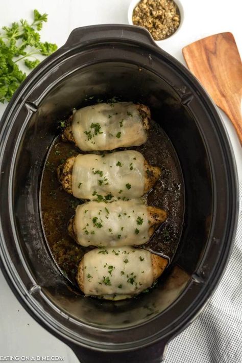 Crock Pot Pesto Chicken Recipe is keto friendly and tasty. The tender and flavorful chicken is topped with pesto and cheese for a meal everyone will love. Crock Pot Pesto Chicken, Crockpot Pesto Chicken, Pesto Chicken Recipe, Pesto Pasta Recipes Chicken, Family Friendly Dinner Recipes, Basil Pesto Chicken, Crockpot Dump Recipes, Air Fryer Recipes Keto, Chicken Pesto Recipes