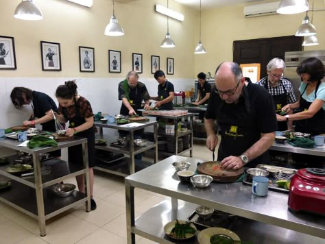 Cooking class at the Hanoi Cooking Centre. This was the single most fun thing we did all week!  Hanoi, Vietnam. Picture by Ritsuko Watanabe. Cooking School Interior, Cooking Class Kitchen, Cooking School Kitchen, Cooking For A Group, Cooking Design, Cooking Photography, Cooking For Beginners, Cooking Chef, Cooking For Two