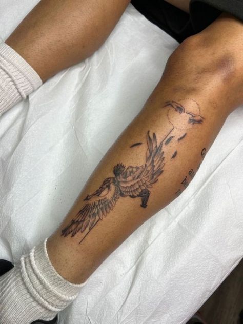 Creative Men’s Tattoos, Namesake Tattoos, Tattoo Art Pieces, Men’s Shin Tattoo Ideas, Side Of Shin Tattoo, Angel Shin Tattoo, Leg Tattoos Angel, Patchwork Tattoo Ideas Legs Men, Angel Tattoo Men Leg