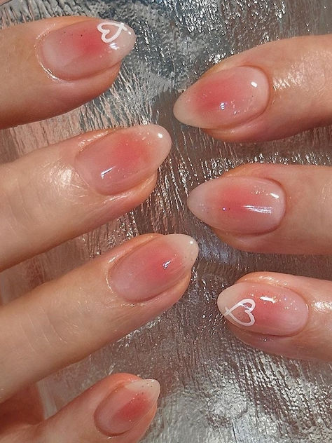 Korean valentines day nails: blush nails with a heart accent Nail Ideas Jelly Nails, Short Nail Minimal Design, Blush Nails Short Almond, Short Nail Designs Asian, Korean Jelly Nails Oval, Korean Simple Nails, Korean Jelly Nails Short Almond, Korean Glass Nails Pink, Light Pink Jelly Nails Acrylic