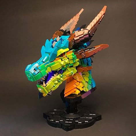 Take a look at this amazingly detailed and colorful dragon by incredible LEGO designer, Wes Talbott (@wes_talbott). Kartu Pokemon, Colorful Dragon, Lego Dragon, Instructions Lego, Lego Sculptures, Lego Display, Lego Boards, Lego Diy, Lego Animals