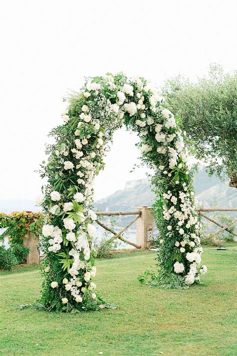 A beautiful flower arch could be a stunning addition for your wedding ceremony. Pin this dreamy idea into your floral ideas.##floralweddingarch #weddingceremony #weddingstyle. Simple Ceremony Arch, Flower Arches, South Of France Wedding, Bridal Party Attire, Flower Arch, Wedding Arches, Wedding Ceremony Arch, A Beautiful Flower, Breathtaking Wedding