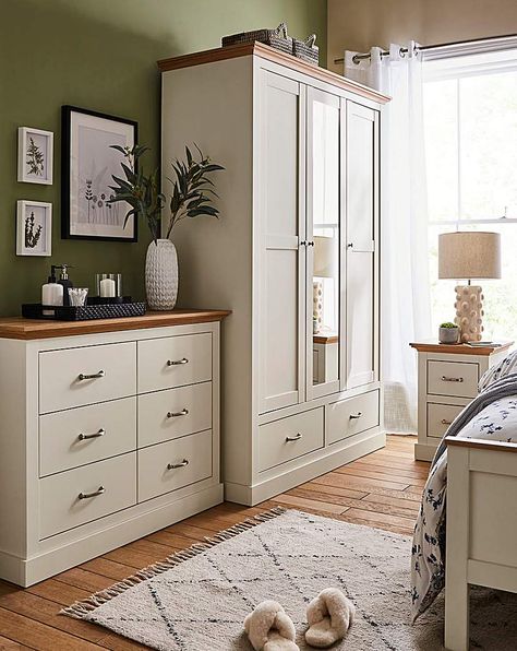 Part of the Julipa Brand. Bring an elegant country-style charm into your bedroom with the Ashford bedroom range. This package includes the 2 x 2 Drawer Bedside, 6 Drawer Chest and the 3 Door Wardrobe. Featuring oak-effect tops which is perfectly contrasted by the wood-effect frame and a chunky plinth, this range is perfect to add a warm and homely feel to your bedroom. Doors feature classic panelling, drawers are sat on easy-glide runners that provide plenty of storage for all your bedroom essen Bedroom Furniture With Storage, Neutral Bedroom Wardrobe Ideas, Freestanding Bedroom Furniture, Bedroom Decor Drawers, Wardrobe And Chest Of Drawers Bedroom, Alvine Kvist Bedroom Ideas, Master Bedrooms With Wardrobes, Bedroom Inspirations With Wardrobe, Cream Wood Bedroom